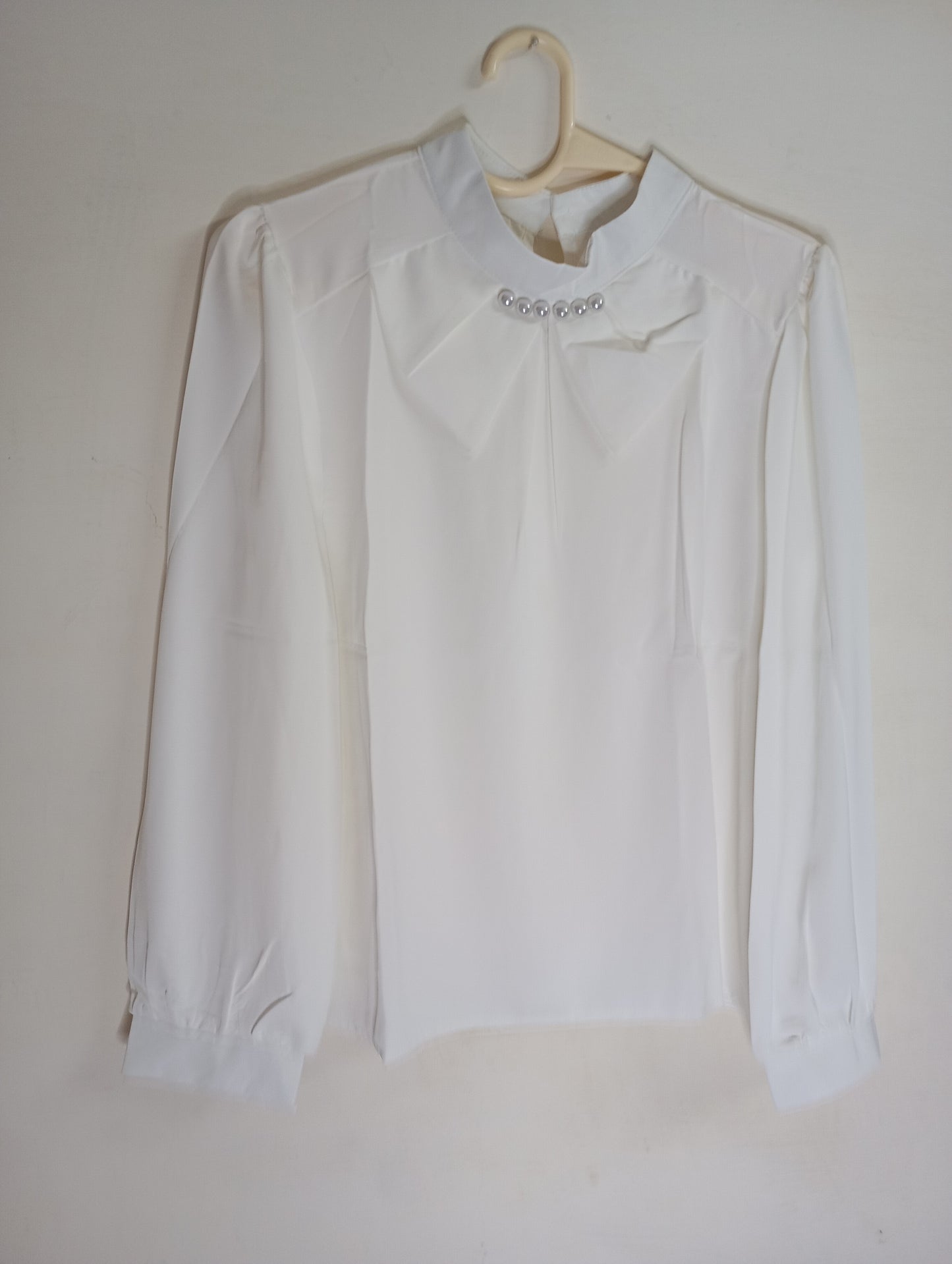 white Blouse with Pearl Embellishments