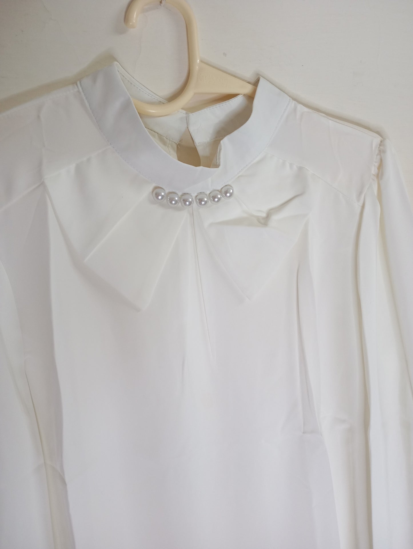 white Blouse with Pearl Embellishments
