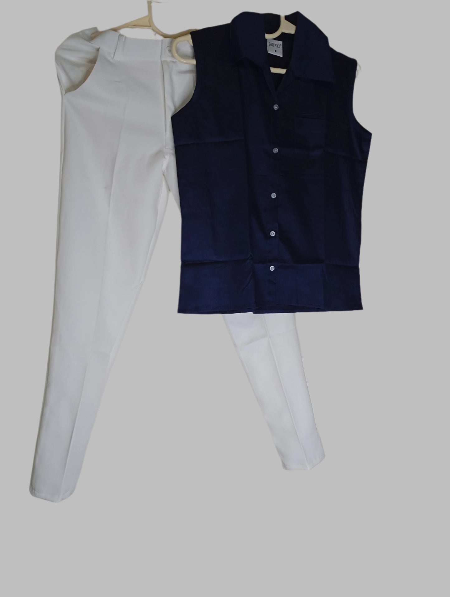 WHITE PANT WITH BLUE SLEEVELESS SHIRT