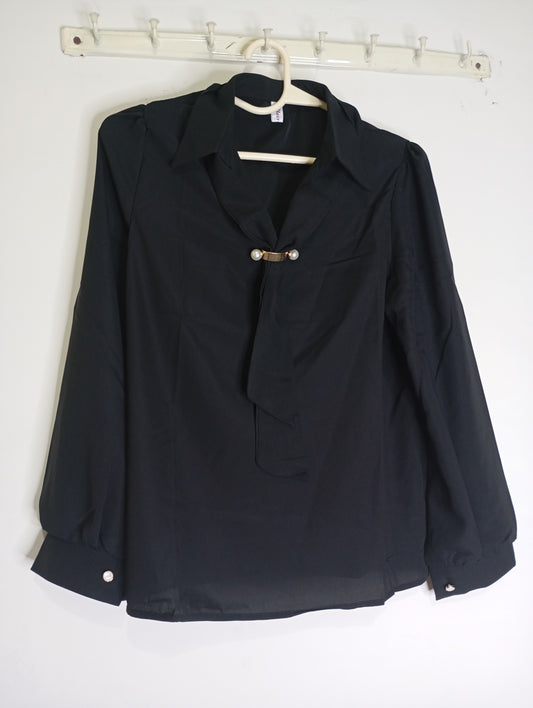 black top with decorative tie