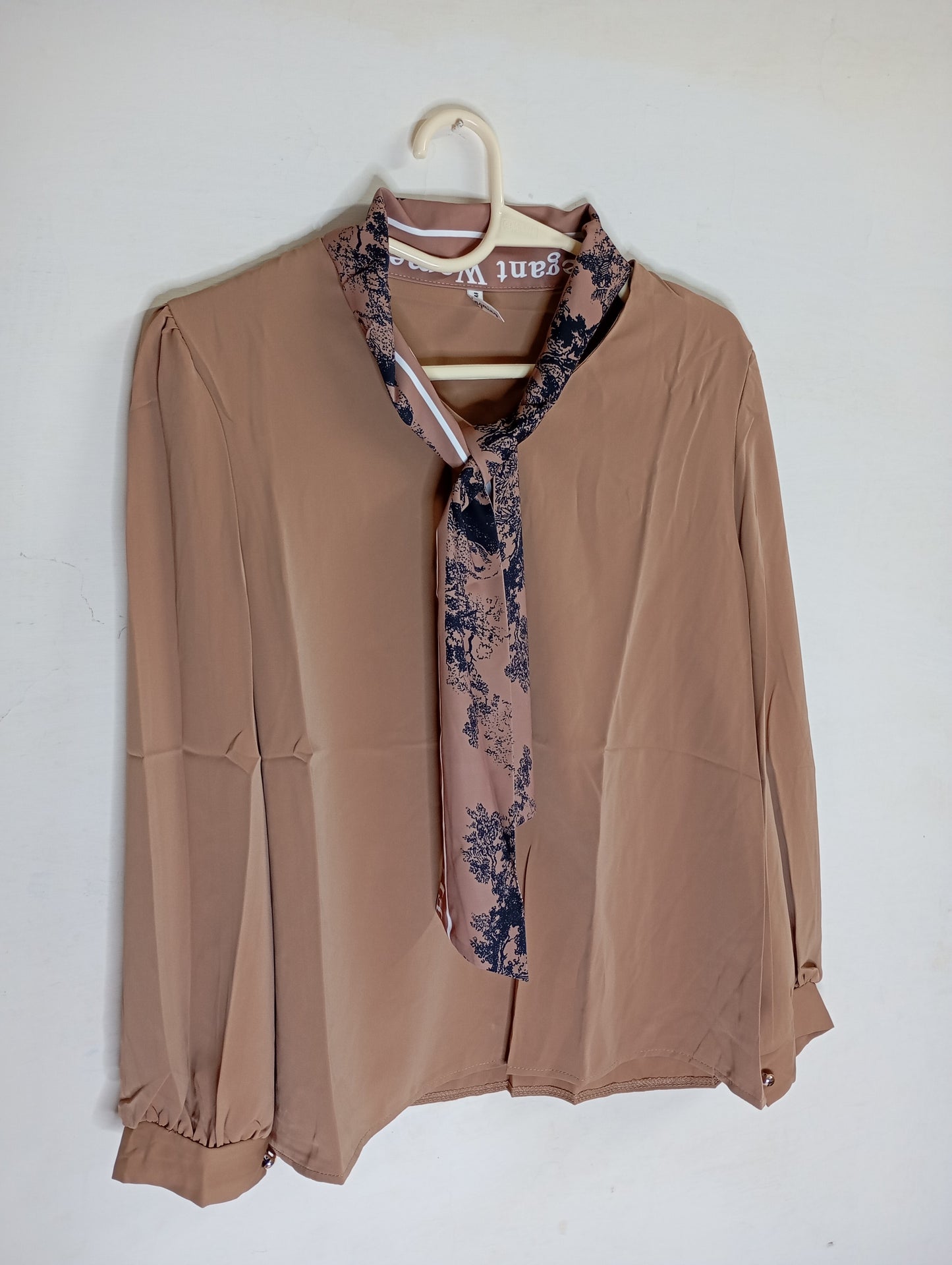 BROWN TOP WITH PRINTED SCARF NECK