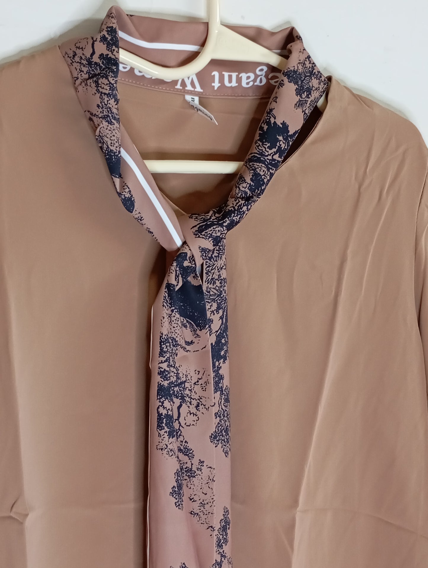 BROWN TOP WITH PRINTED SCARF NECK